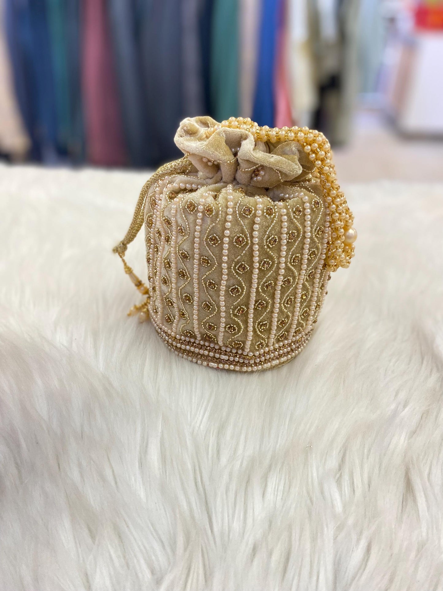 Designer Bridal Potli Bag for women with Embroidery and Embellished Stones