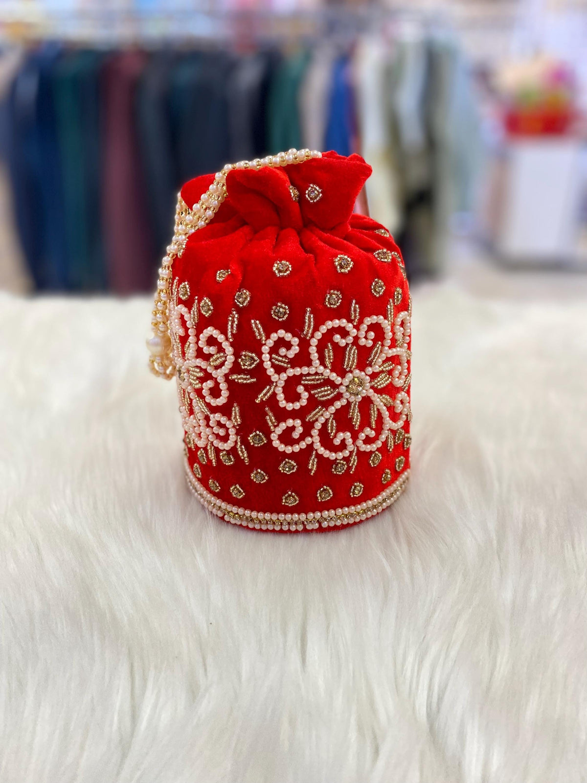 Designer Bridal Potli Bag for women with Embroidery and Embellished Stones