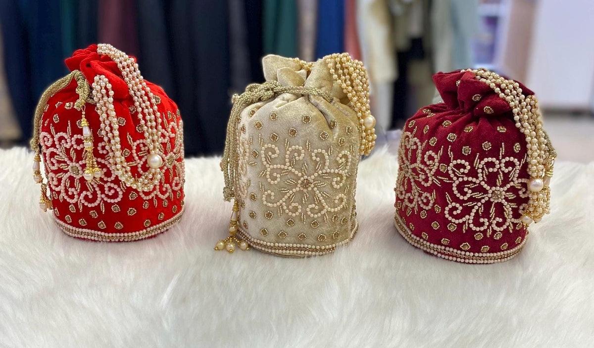 Designer Bridal Potli Bag for women with Embroidery and Embellished Stones