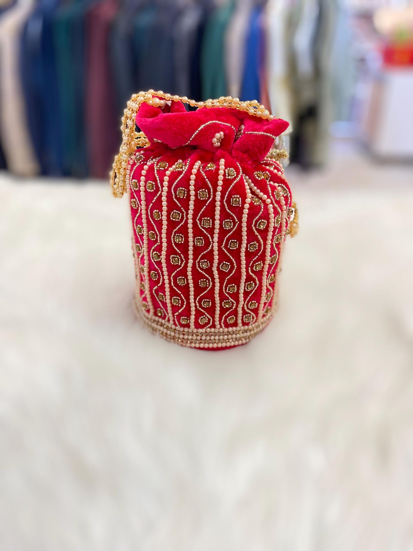 Designer Bridal Potli Bag for women with Embroidery and Embellished Stones