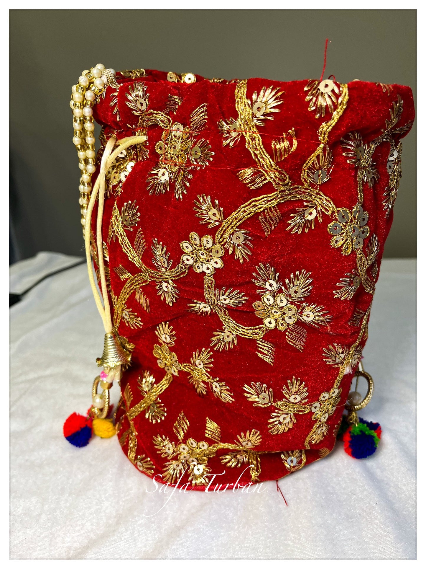 Multi Colour Potli Bag for women with Golden Embroidery and Pearl Handle
