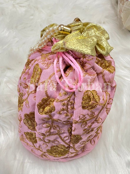 Multi Colour Potli Bag for women in Baby Pink colour with Golden Embroidery and Pearl Handle
