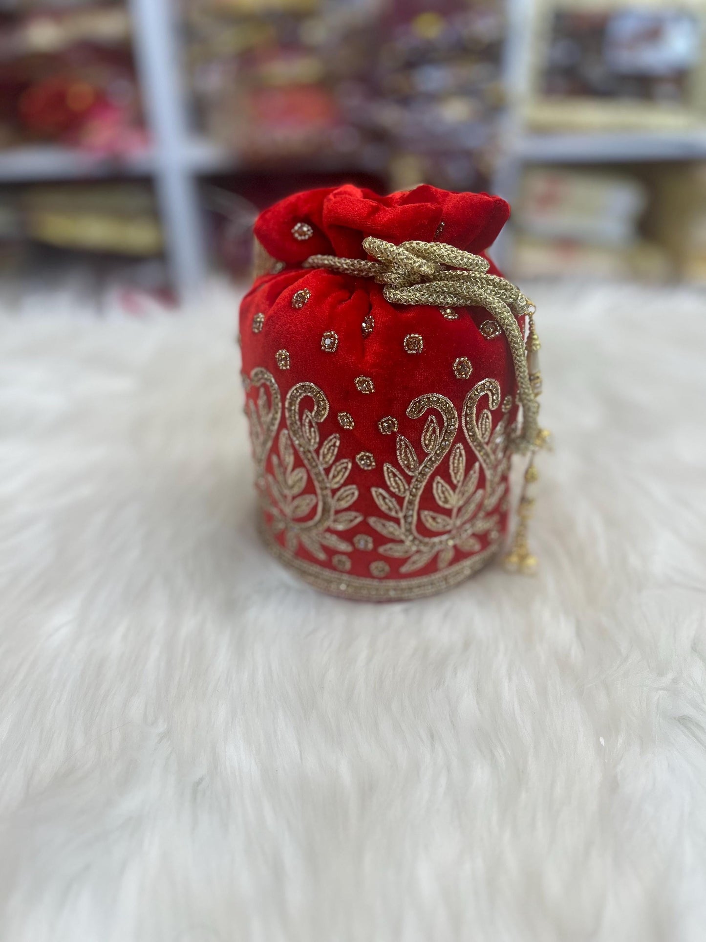 Designer Bridal Potli Bag for women with Embroidery and Embellished Stones