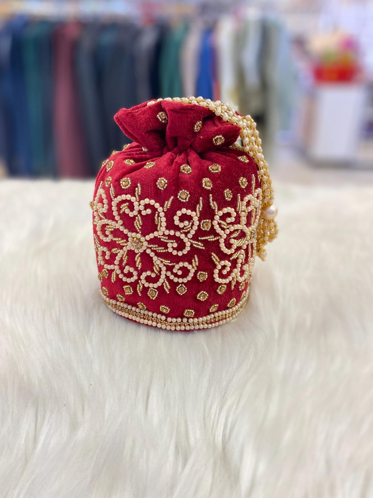 Designer Bridal Potli Bag for women with Embroidery and Embellished Stones