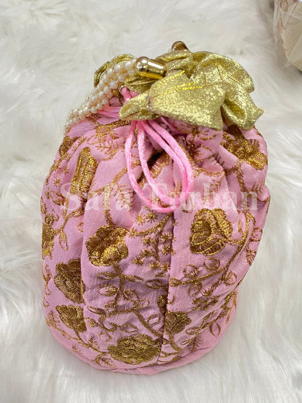 Multi Colour Potli Bag for women in Baby Pink colour with Golden Embroidery and Pearl Handle