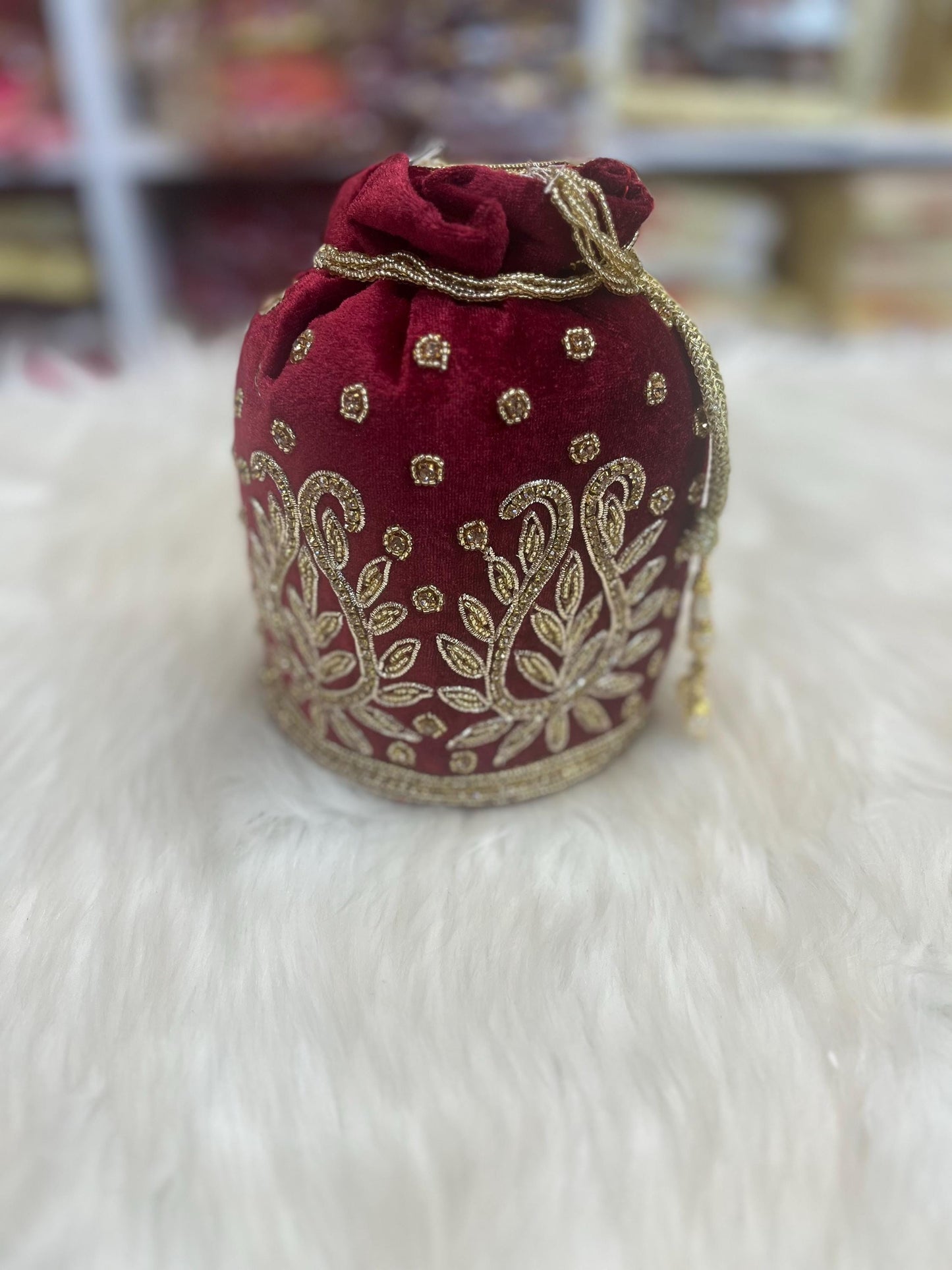 Designer Bridal Potli Bag for women with Embroidery and Embellished Stones