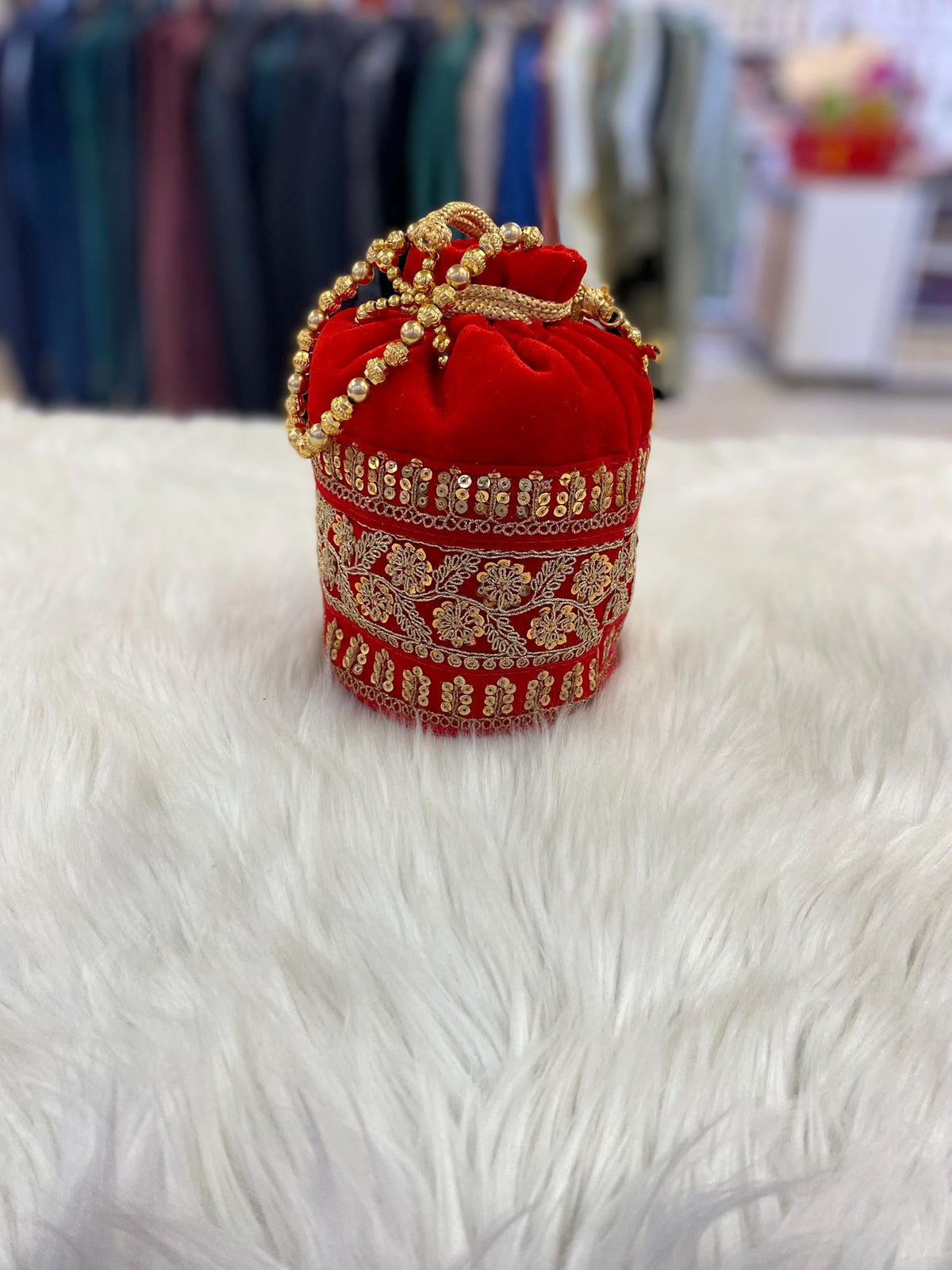 Designer Bridal Potli Bag for women with Embroidery and Embellished Stones